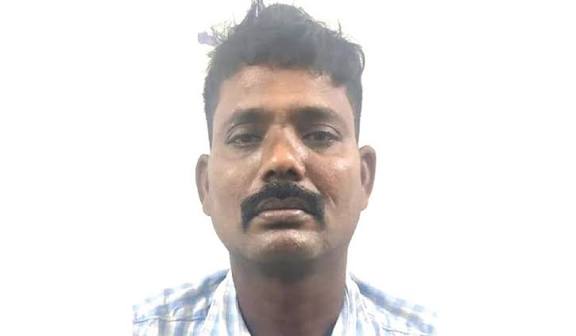 காவல் நிலையத்துக்கு வெடிகுண்டு மிரட்டல்: துணி தேய்க்கும் தொழிலாளி கைது