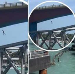 பாம்பன் பாலத்தில் இருந்து கடலில் குதித்த இளைஞர் - வைரல் வீடியோவால் விசாரணை