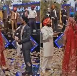 திருமண வரவேற்பில் மணமகளை ரூபாய் நோட்டுகளை தூவி வரவேற்ற மணமகன் குடும்பத்தினர்